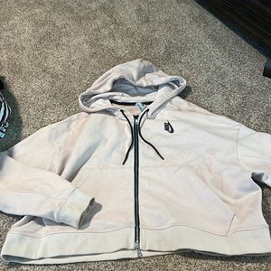 Light blush pink Nike zip up tech